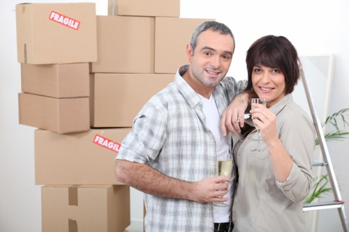 Experienced professionals unpacking belongings in a new home.